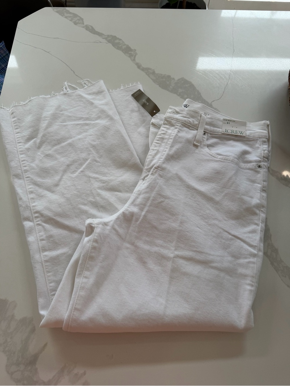 Women white J.Crew Slim Wide-Leg Jeans in a size 31